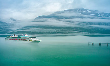 Passenger ship in Nordic waters, illustrating MED and MER certification of marine equipment, maritime standards and global market access for manufacturers.